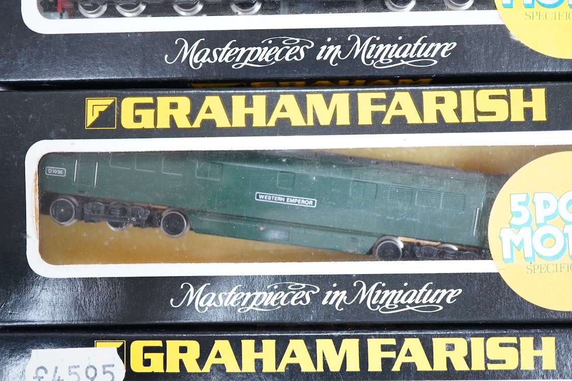 Four boxed Graham Farish N gauge railway diesel locomotives; a BR class 52, Western Emperor D1036 (8424), a BR class 47, D1662 (8004), a BR Rail Freight 47231, (8008) and a BR class 40, D348 (8115).